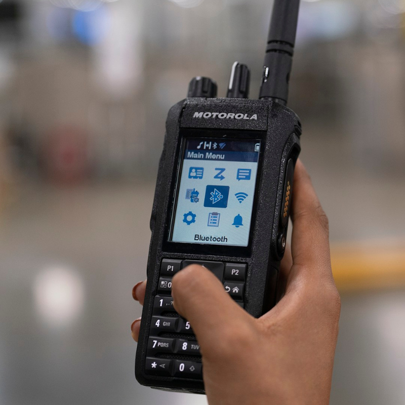 Person holding the Motorola R7 FKP
