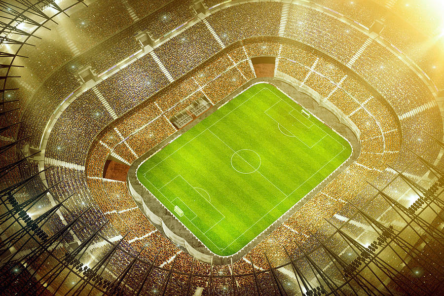 Birds eye view looking down into a packed football stadium