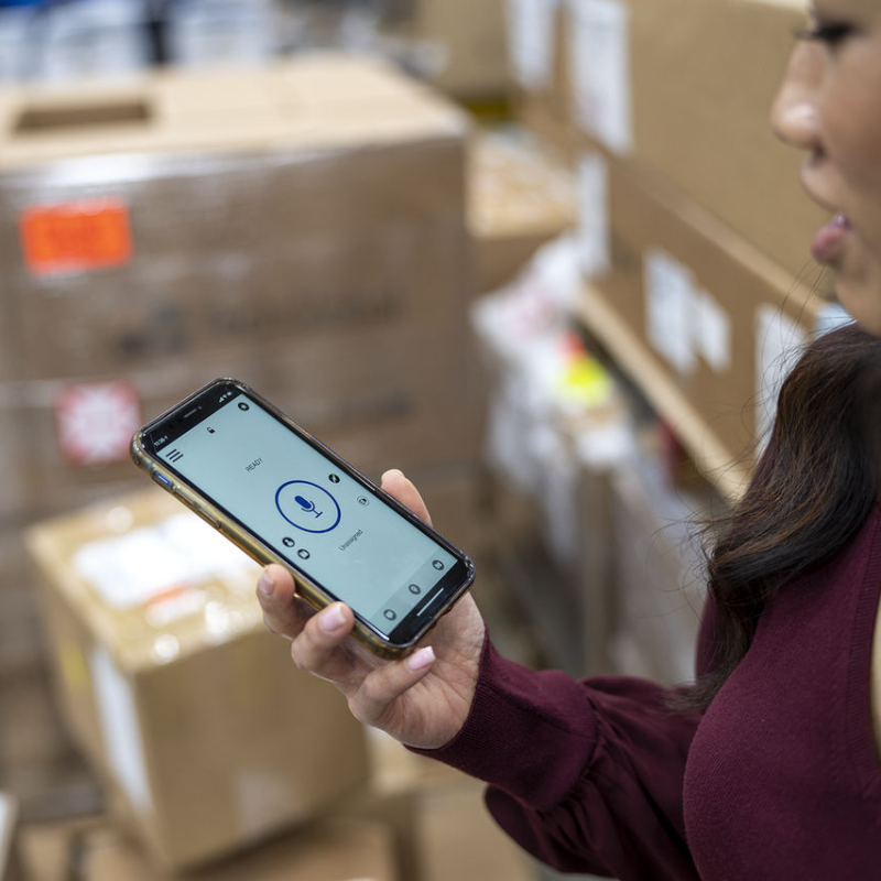 Woman using the Motorola Wave app on her phone